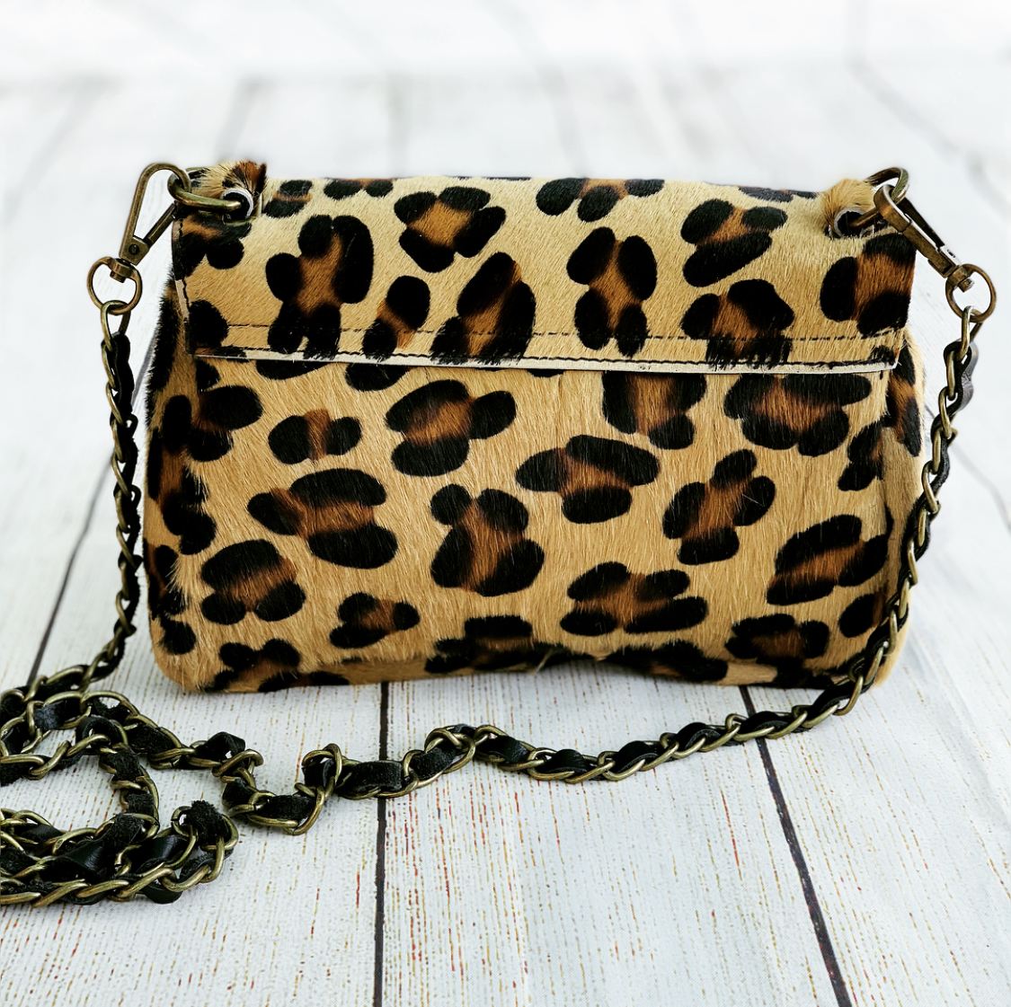 Sac pochette leopard sale